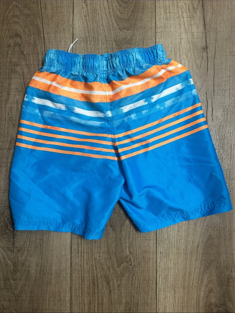 Under Armour size youth large Blue and Orange Boys Swim Shorts EUC